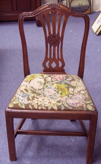 Appraisal: An th Century mahogany single chair with pierced and carved