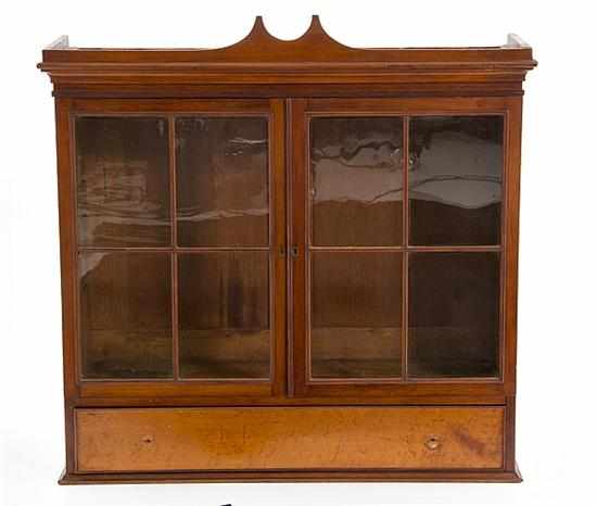 Appraisal: Federal cherry and bird's-eye maple hanging cupboard early th century