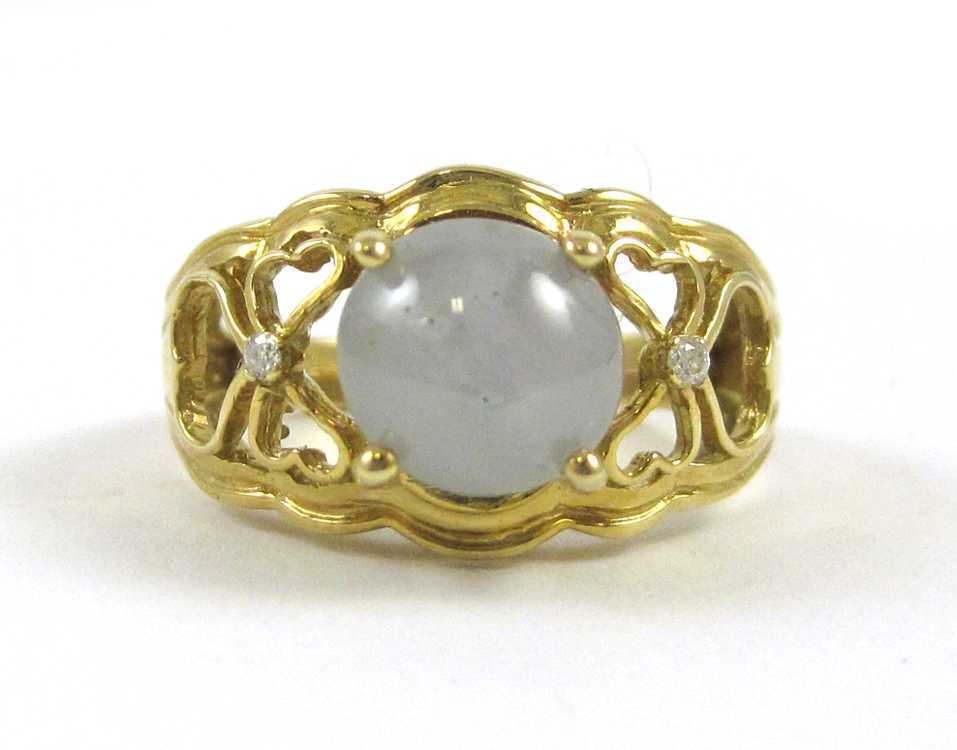 Appraisal: POWDER BLUE STAR SAPPHIRE AND DIAMOND RING The k yellow