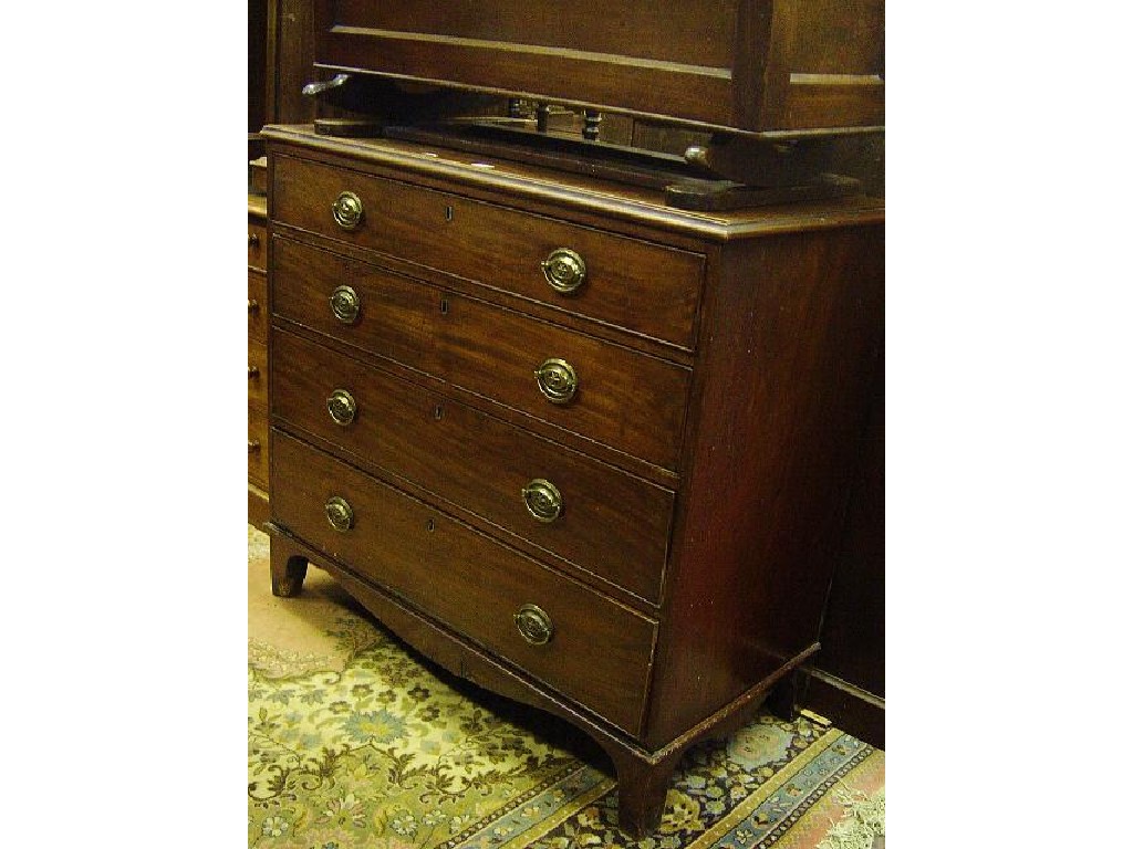 Appraisal: A Georgian mahogany chest fitted with long graduated drawers over