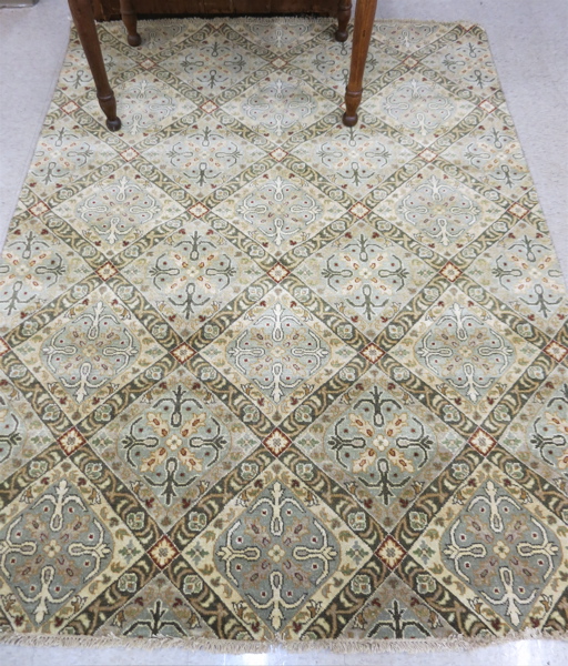 Appraisal: HAND KNOTTED ORIENTAL AREA RUG overall floral panel design without