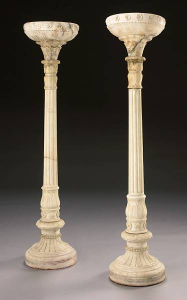 Appraisal: A pair of Italian Neoclassical style alabaster floor lamps circa