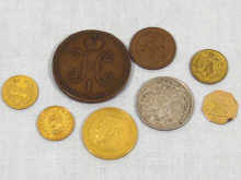 Appraisal: A quantity of coins including a Russian gold rouble dated