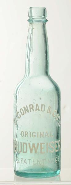 Appraisal: C Conrad Budweiser Embossed Beer Bottle This lot contains the