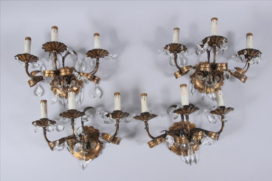 Appraisal: FOUR ITALIAN GILT METAL THREE-LIGHT WALL SCONCES th century Petal