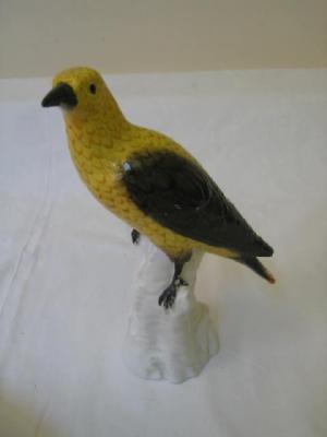 Appraisal: A BERLIN PORCELAIN FIGURE modelled as a yellow bird with