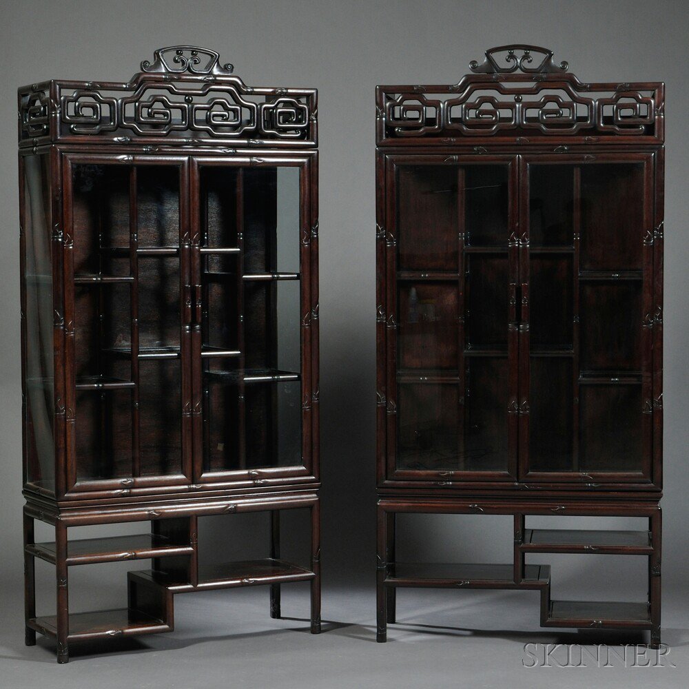 Appraisal: Pair of Faux Bamboo Display Cabinets China hardwood glazed doors