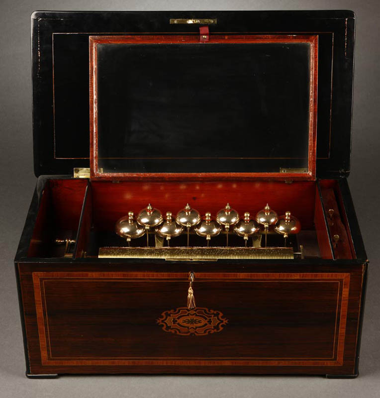 Appraisal: A Swiss cylinder rosewood marquetry music box A Swiss cylinder