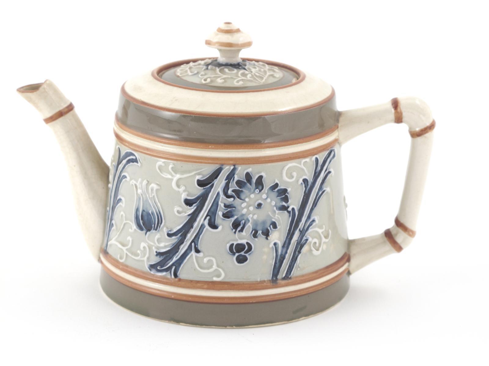 Appraisal: Gesso Faience a James Macintyre and Co teapot and cover