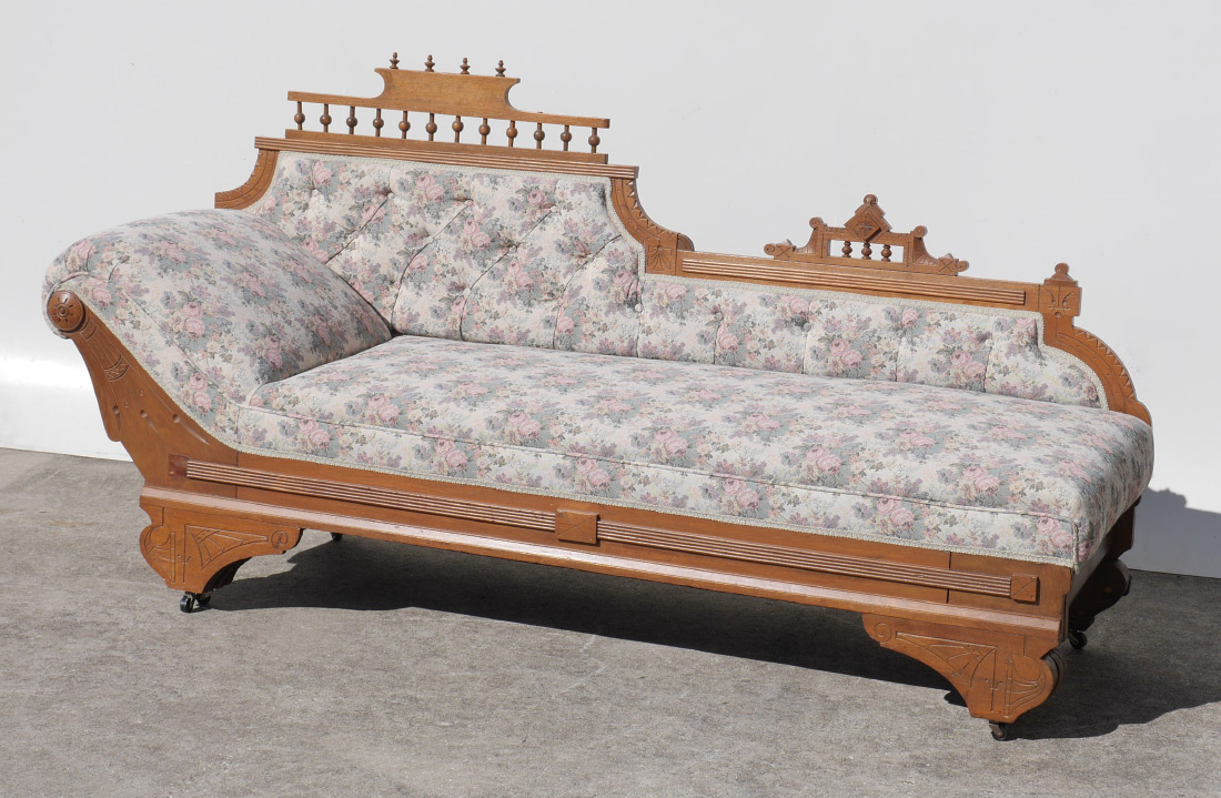 Appraisal: EXPANDING CARVED VICTORIAN FAINTING COUCH Carved frame with stick and