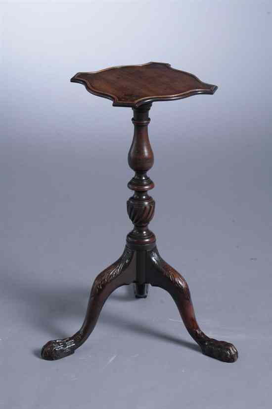 Appraisal: GEORGE III MAHOGANY PEDESTAL-BASE STAND Square top with serpentine edge