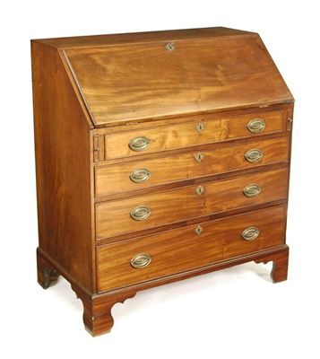 Appraisal: A George III mahogany bureau with a fitted interior central