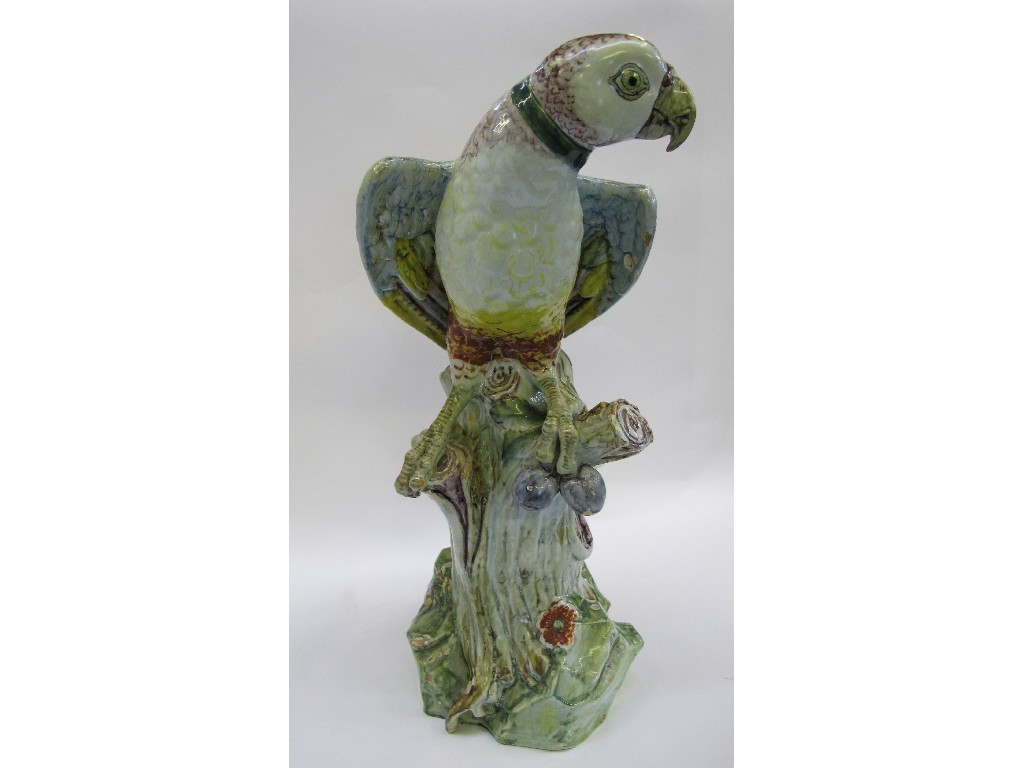 Appraisal: Large tin glazed figure of a parrot sat upon a