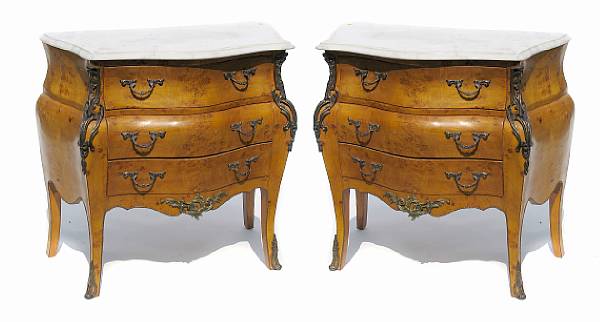 Appraisal: A pair of Louis XV style marble topped commodes height