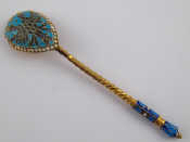 Appraisal: A gilt metal tests silver and enamel spoon in the