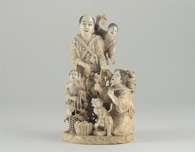 Appraisal: A good Japanese ivory okimono group of a family all