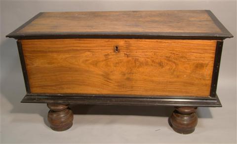 Appraisal: SRI LANKAN EBONY AND SATINWOOD CHEST ON BUN FEET the