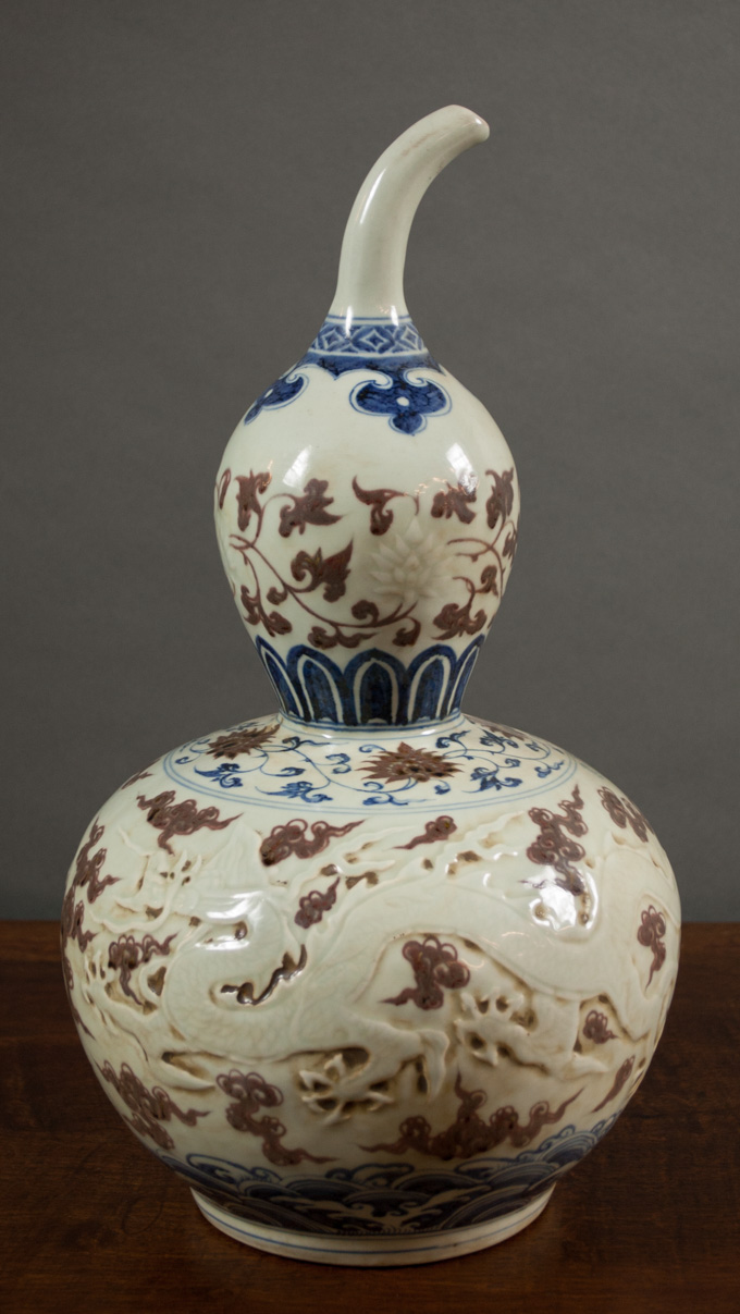 Appraisal: CHINESE MING STYLE BLUE AND RED GLAZED GOURD VASE having