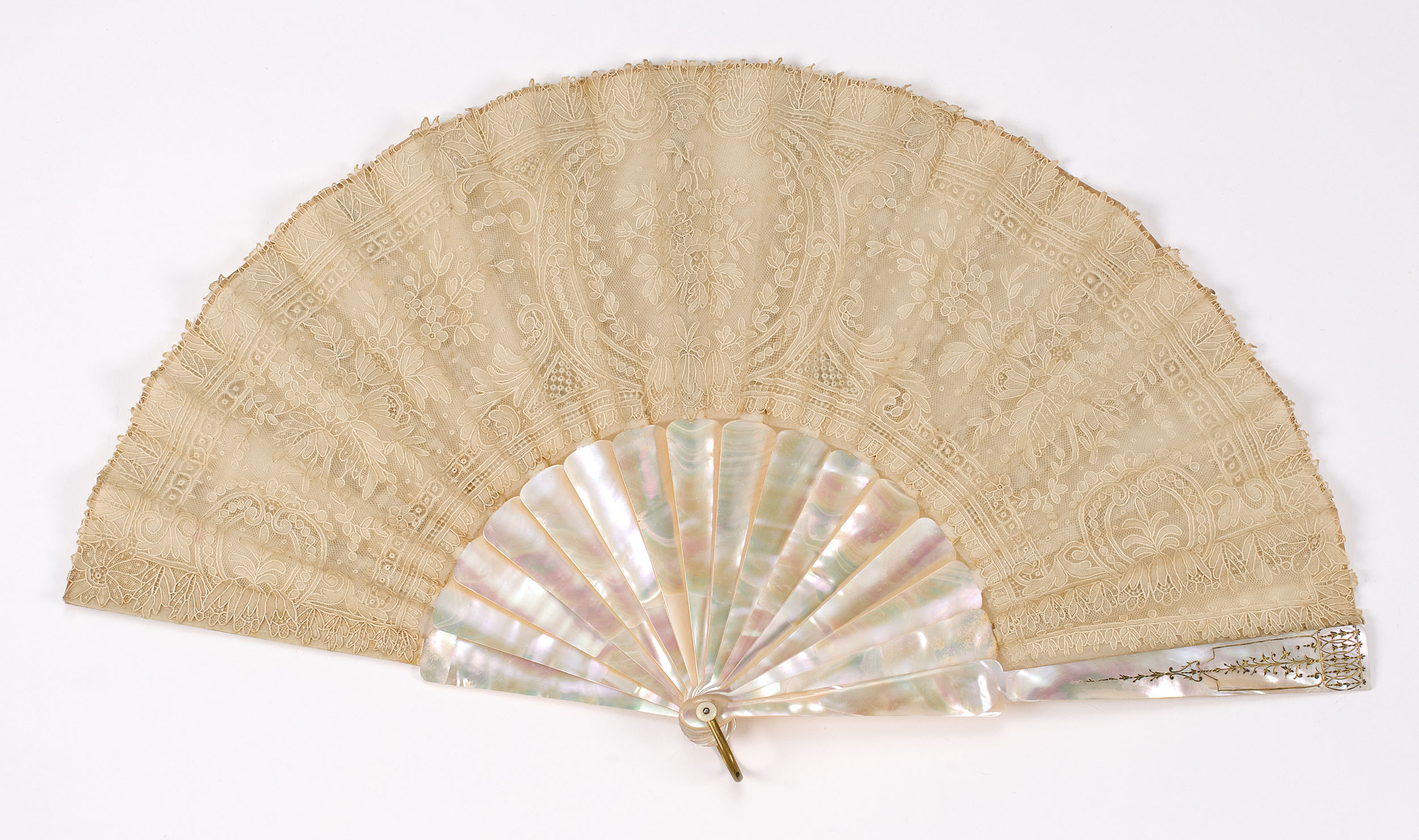 Appraisal: LACE AND MOTHER-OF-PEARL FOLDING FAN French Late th CenturyBeautiful applied