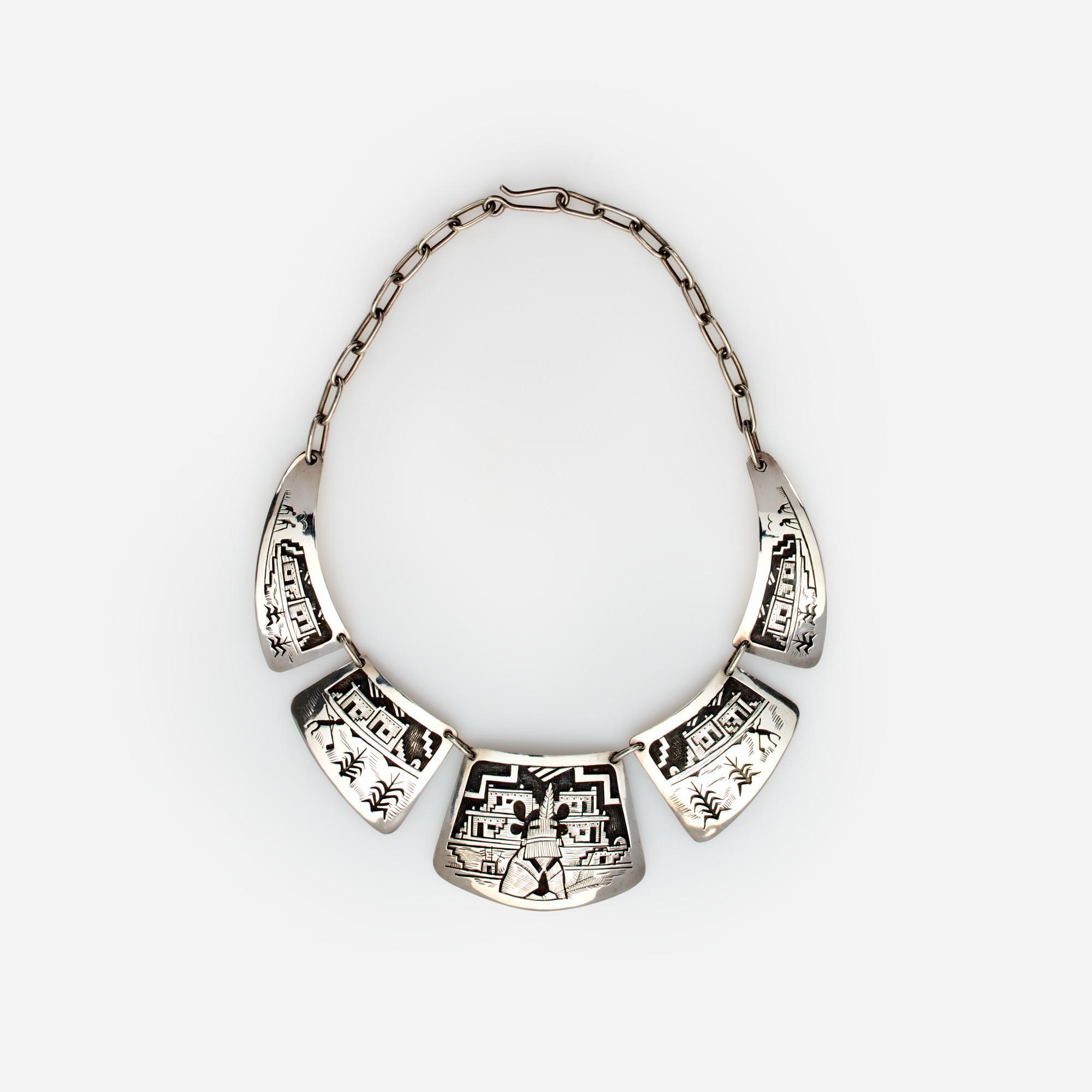 Appraisal: VICTOR COOCHWYTEWA SILVER OVERLAY NECKLACE FROM KOPAVI A silver overlay