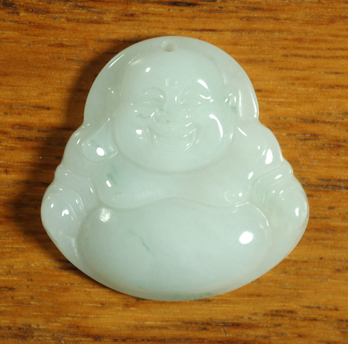 Appraisal: CARVED JADE BUDDHA PENDANT of light green jade height inches