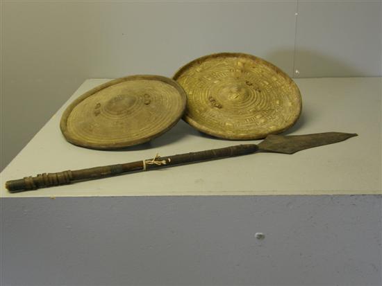 Appraisal: Two African buffalo hide shields and a lion spear the