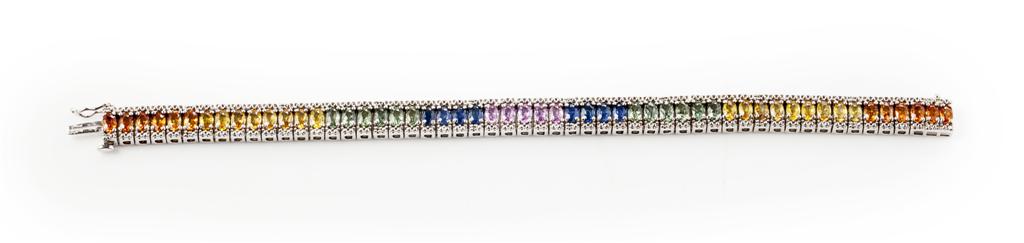 Appraisal: A multi-coloured sapphire set bracelet claw set with fifty-four multi-coloured