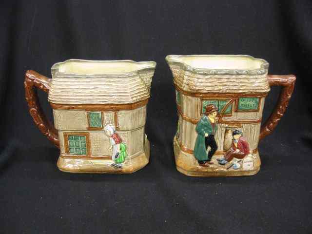 Appraisal: Royal Doulton Dickensware Pitchers ''Old Curisity Shop'' ''Oliver Twist'' ''