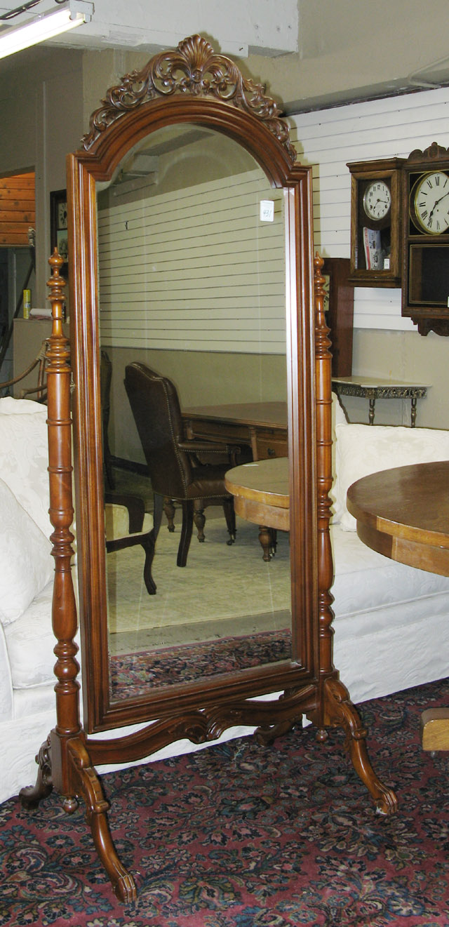 Appraisal: VICTORIAN STYLE MAHOGANY CHEVAL MIRROR AND FLOOR STAND the long