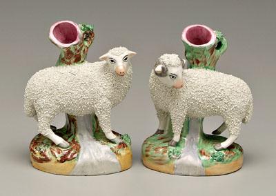 Appraisal: Pair Staffordshire spill vases each with standing sheep British th