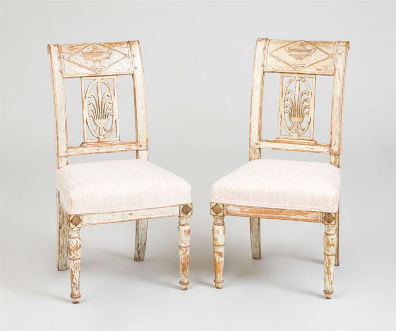 Appraisal: PAIR OF DIRECTOIRE PROVINCIAL WHITE PAINTED CHAISES LA REINE Upholstered