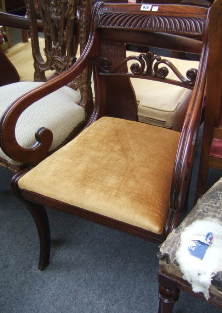 Appraisal: A George IV mahogany open armchair with a gadrooned top