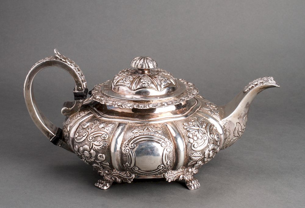 Appraisal: George IV Irish Silver Repousse Teapot th C George IV