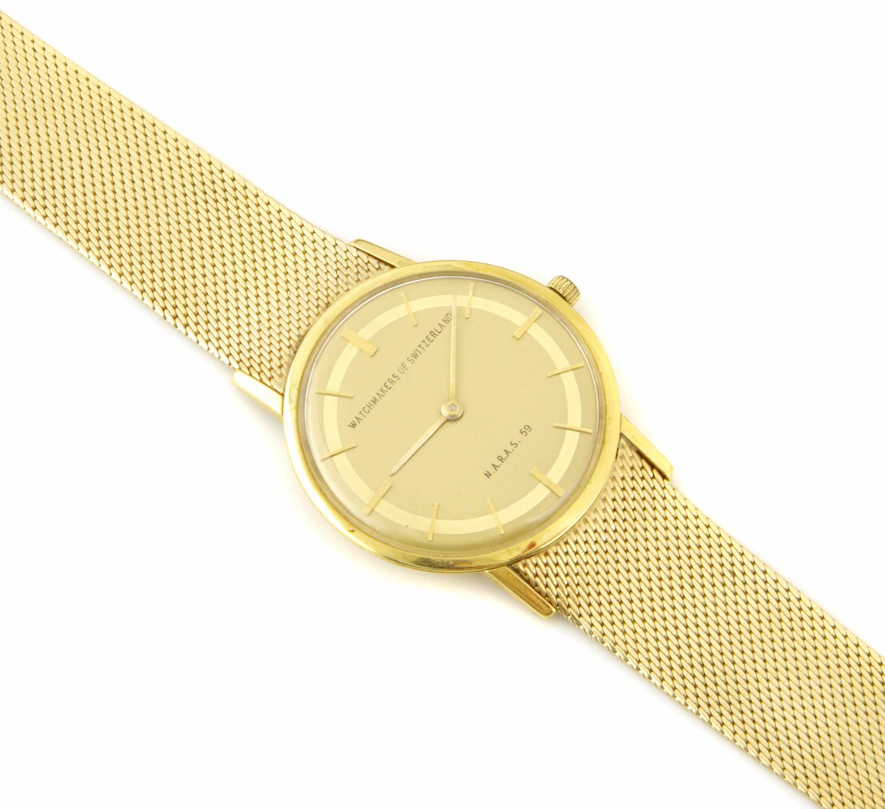 Appraisal: An k watch head with a k gold mesh bracelet