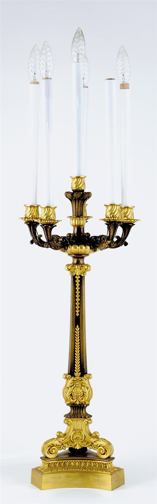 Appraisal: Louis Philippe parcel-gilt bronze six-light candelabrum th century flared panel