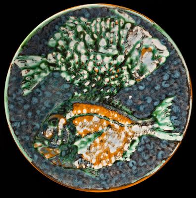 Appraisal: Tony Morris for Poole Studios circular charger decorated two fish