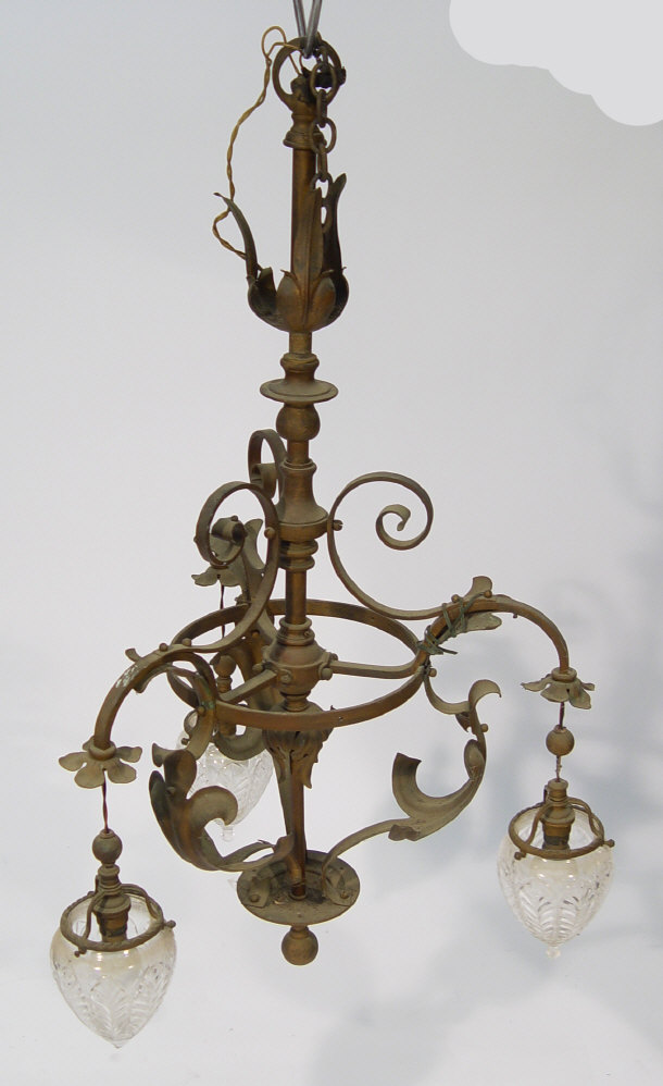 Appraisal: Ornate brass three branch chandelier fitted with cut glass shades