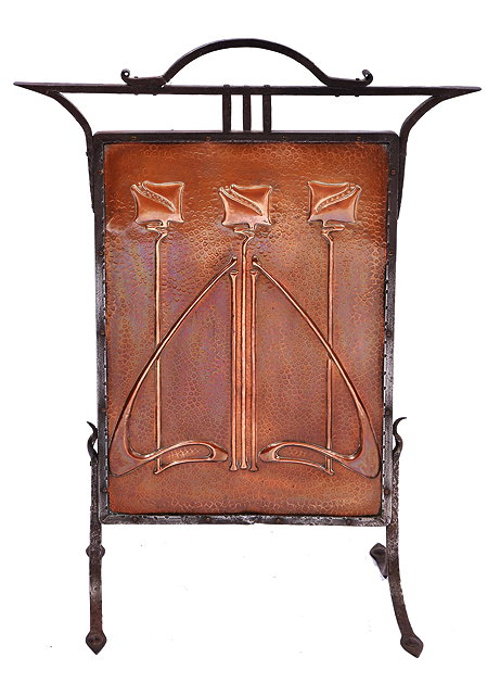 Appraisal: AN ART NOUVEAU BEATEN COPPER FIRE SCREEN with steel frame