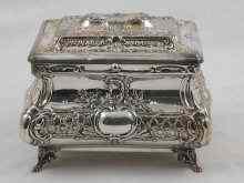 Appraisal: A white metal test silver tea caddy with gilt interior