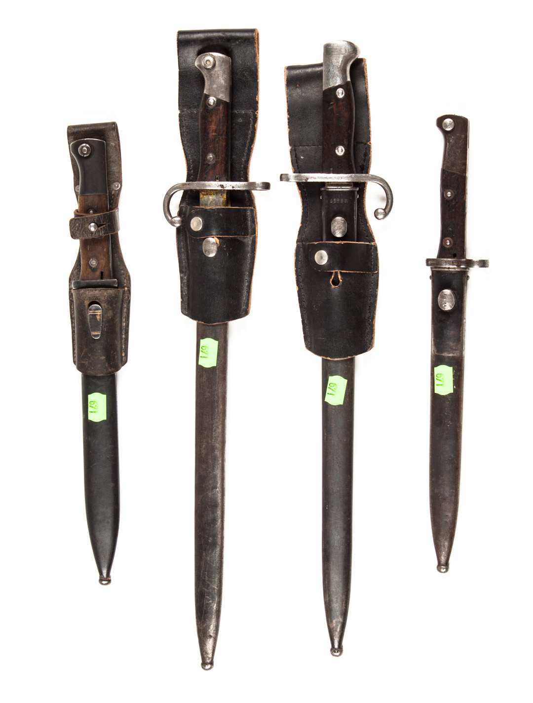 Appraisal: Four assorted bayonets with scabbards including two Mauser Modelo Argentino