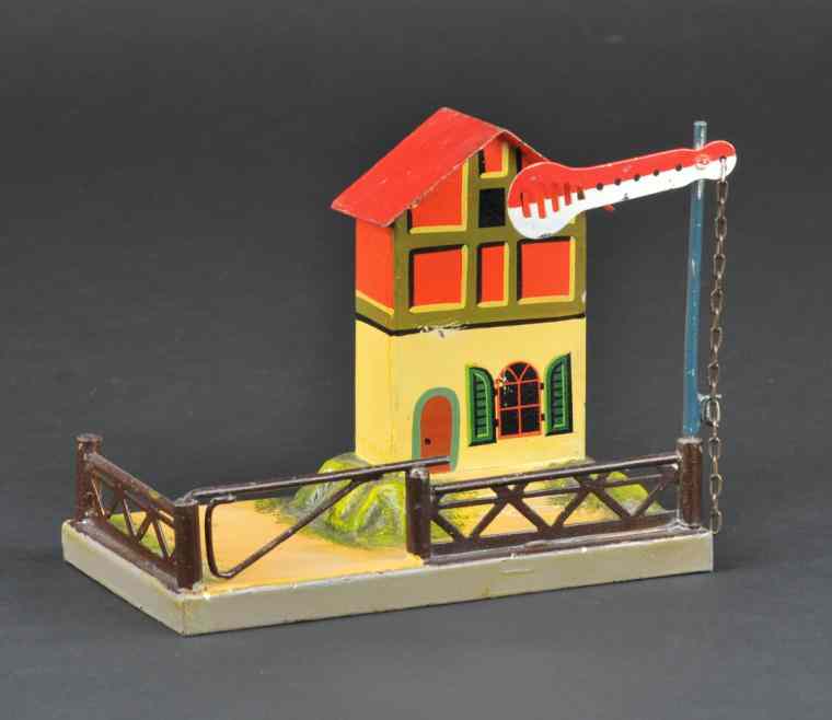 Appraisal: MARKLIN CROSSING GATE Germany hand painted tin crossing gate w