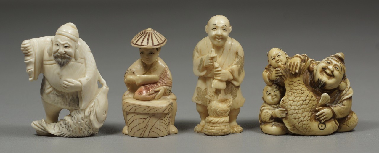 Appraisal: carved ivory Japanese netsuke fishmongers signed man with chicken tallest