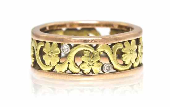 Appraisal: A Vintage Gold and Diamond Foliate Motif Band consisting of