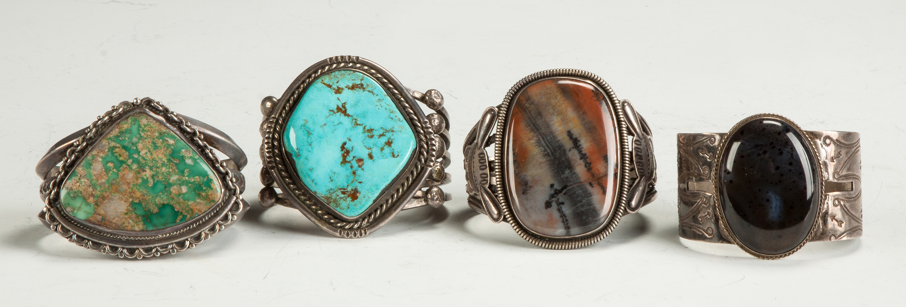 Appraisal: Turquoise and Hard Stone Navajo Bracelets One bracelet is signed