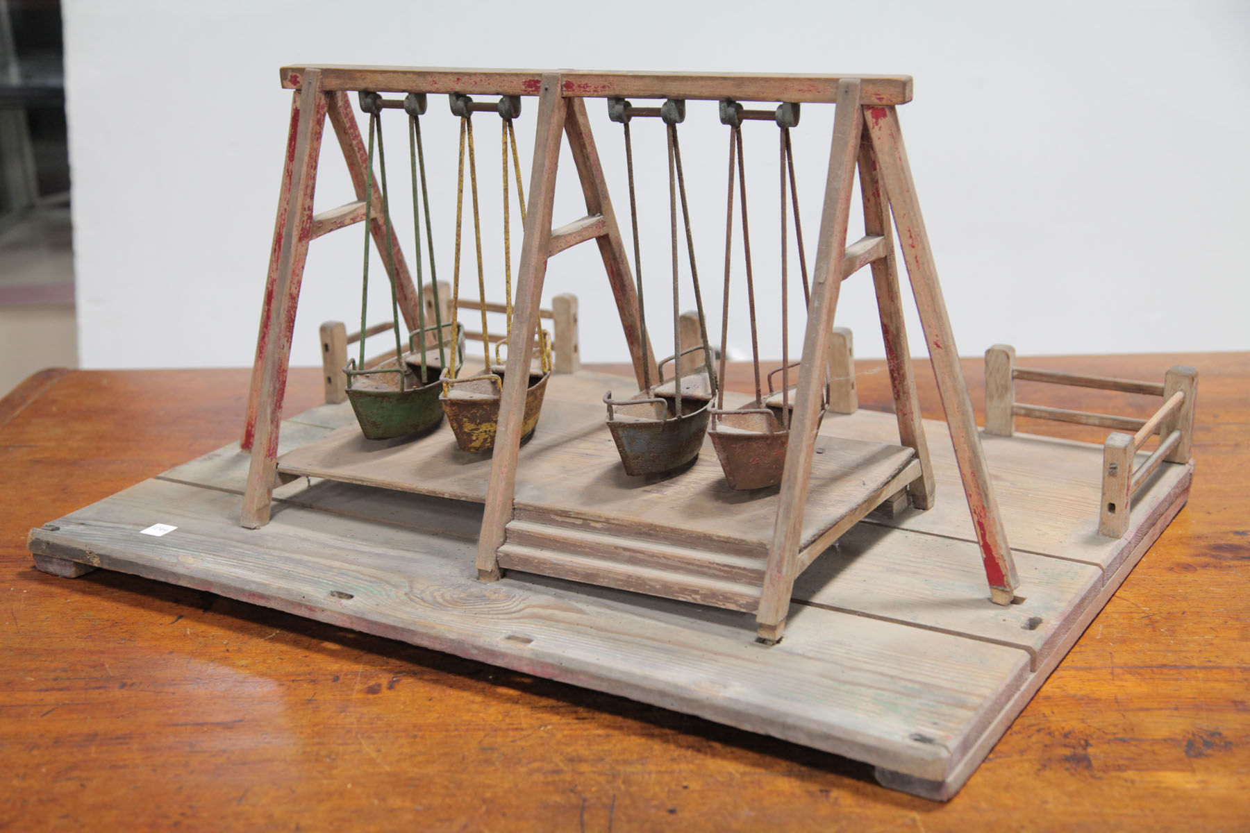 Appraisal: CHILD'S TOY SWING SET American early th century Pine swing