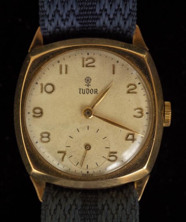 Appraisal: TUDOR GENTLEMAN'S CUSHION-SHAPED WRISTWATCH with Arabic numerals and subsidiary seconds