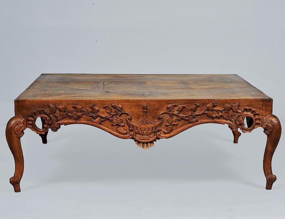 Appraisal: PROVINCIAL STYLE COFFEE TABLE The square parquetry top above the