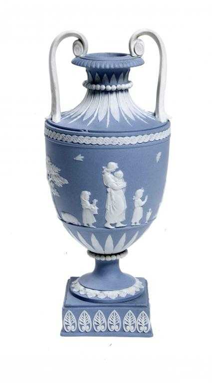 Appraisal: A WEDGWOOD LIGHT BLUE JASPER WARE VASE ornamented with reliefs