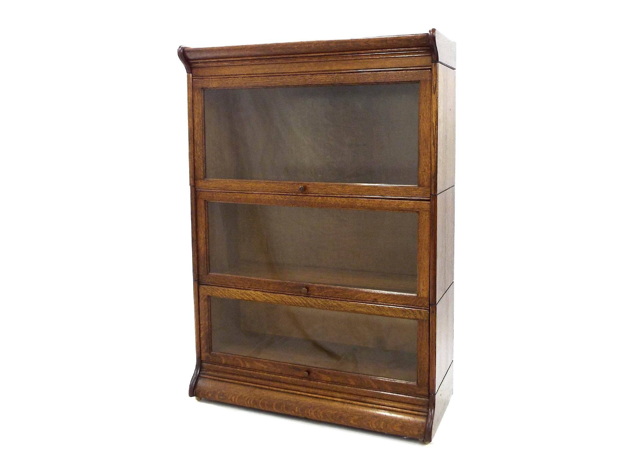 Appraisal: Globe Wernicke type oak three section bookcase with glazed rising