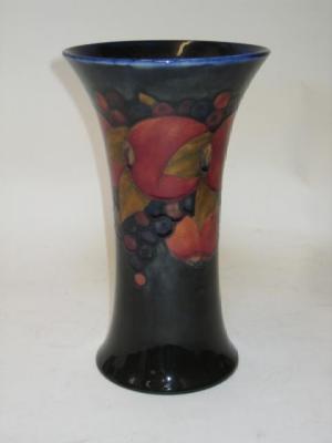 Appraisal: A WILLIAM MOORCROFT POTTERY VASE of waisted form tube lined